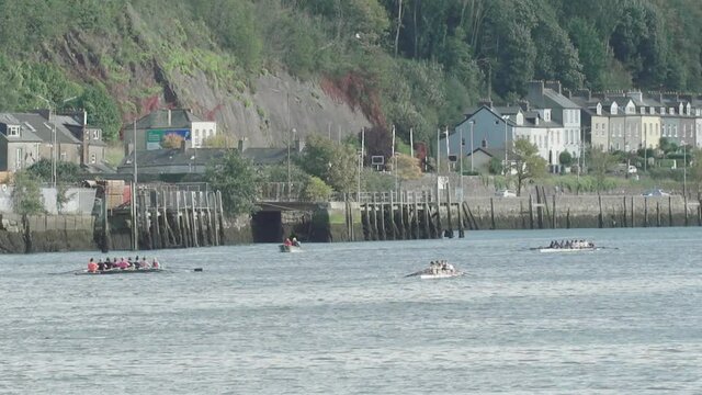 Rowing Boats enter Cork city Port of Cork in Ireland