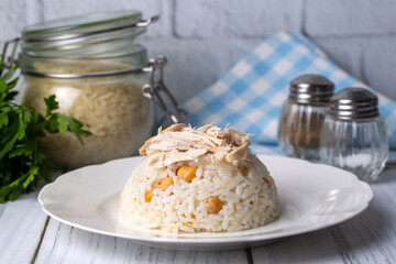 Traditional delicious Turkish food; Rice with chickpeas and chicken (Turkish name; Tavuklu nohutlu pilav or pilaf)
