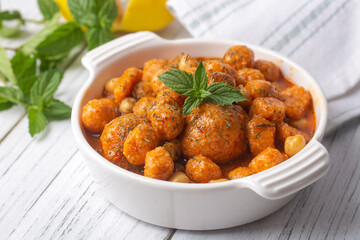 Traditional delicious Turkish foods; Bulgur soup (Turkish name; Anali Kizli, icli kofte)