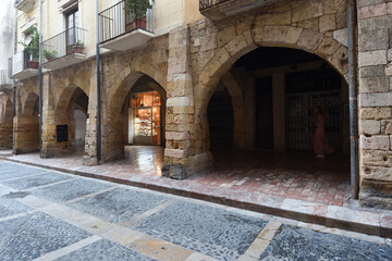 arcade of Merceria street in Tarragona, Catalonia, Spain