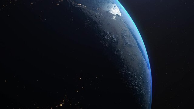 Amazing realistic animation of the earth seen from space, on dark background with moving stars. Sun illuminating the earth. High quality 3D animation. 4K UHD. moving clouds.