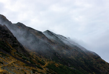 steam over a mountain slope