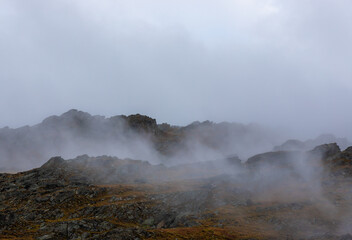 steam over a mountain slope