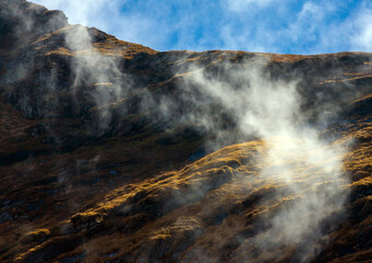 landscape with the ridges of the Fagaras mountains among the clouds