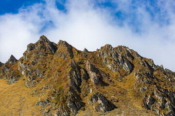 landscape with a rocky mountain slope