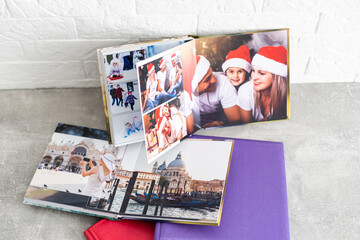 Banner Photobook Album with Travel Photo on Wooden Table background