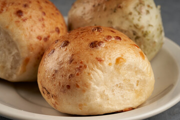 close up bread flavored with salami and cheese