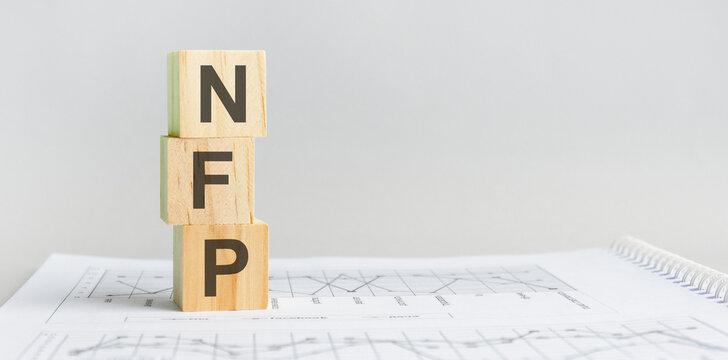 the word NFP structured query language, lined with wooden blocks