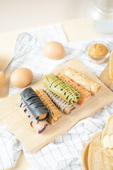 Crispy crepe roll with fresh sweet cream. Thai dessert call ‘kanhom tokyo’.