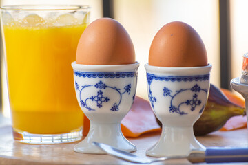 Continental breakfast with soft-boiled chicken egg served outdoor