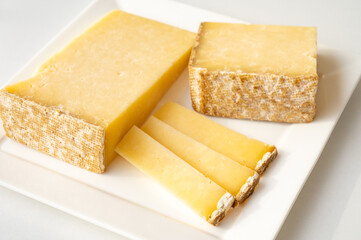 Cheese collection, hard French cheese old cantal made from raw cow milk with rind
