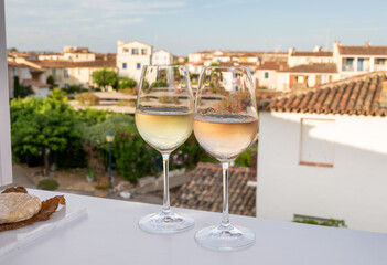 Summer on French Riviera Cote d'Azur, drinking cold rose and white wine from Cotes de Provence on...