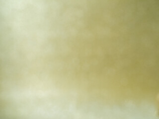 Golden glitter background with bokeh for festive holidays 