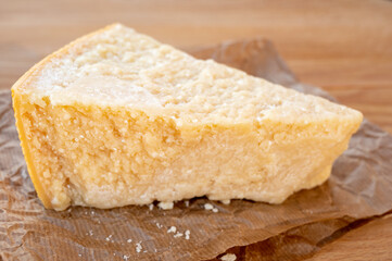 Cheese collection, piece of matured cow cheese pasmesan parmigiano reggiano made from cow milk