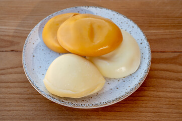 Cheese collection, variety of Italian cow milk cheese flat scamorza