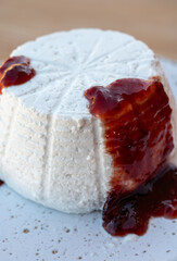 Cheese collection, white Italian soft cheese ricotta served as sweet dessert with homemade plum jam