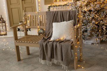 the bench is covered with a blanket. decor of the winter courtyard of the house