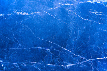 Blue marble striped wall. Cool blue background with marble texture.
