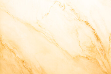 A yellowed marble wall. Yellow background with marble texture.