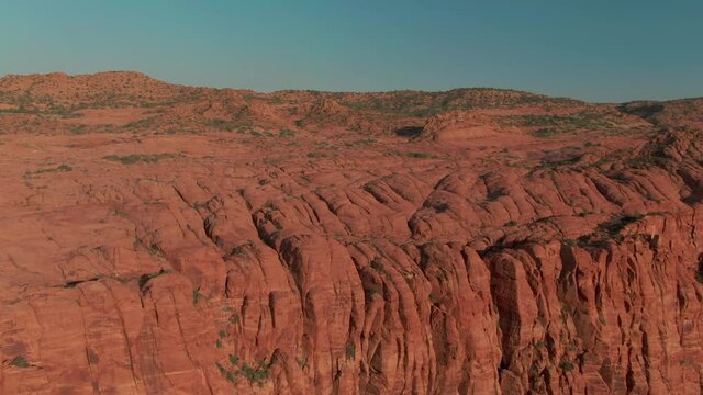 Aerial: Red rock cliffs at Hellhole Canyon, St George, Utah, USA