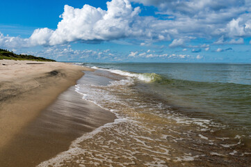 Sea coast. Tides and storms at sea. Waves on the Baltic Sea. Deserted seashore.