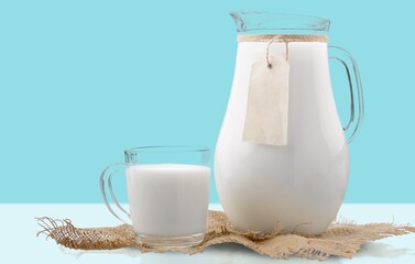 Pure milk drinks in clear jars and bottles, naturally healthy foods