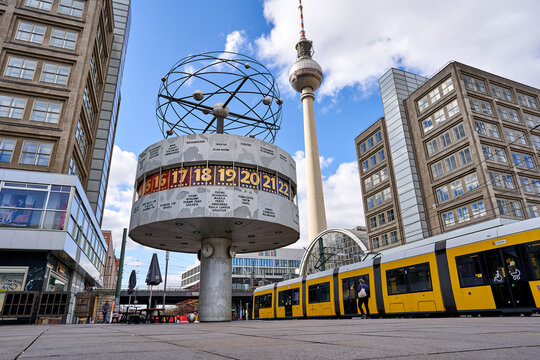 Berlin, Germany - 21.03.2021: panoramic view on the Urania World Clock in Berlin and TV Tower on the Alexander Square,  a tourist attraction and meeting place