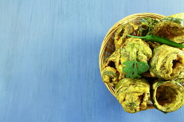 traditional indian gujarati tea time snack food dish aluvadi or patra in basket