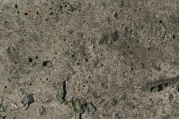 Close-up of the old concrete pavement. Dirty concrete floor. The texture of old concrete.