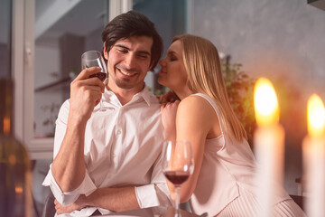 Young loving couple during a romantic dinner