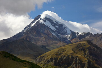 Fototapeta premium Mount Kazbegi (Kazbek) in sunny weather