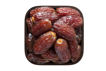 dried royal dates fruit in square bowl isolated on white background. organic food, top view.
