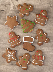 Traditional christmas gingerbread cookies over a wooden table