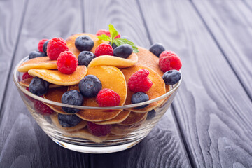 Mini pancakes . Delicious breakfast .