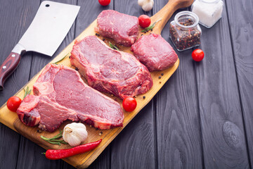 Assortment of beef steak . T-bone , ribeye and fillet mignon