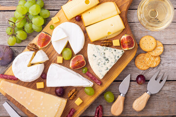 Cheese board with fruits and snack