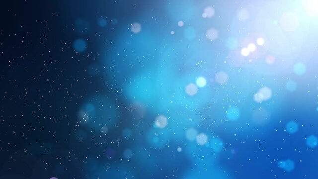 Blue blurred motion background with particles, lights and snow.