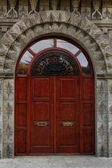 Fototapeta na wymiar old wooden door in a church