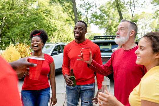 Friends Partying At A Tailgate Event