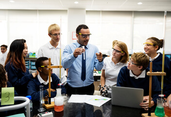 Group of students laboratory lab in science classroom - Powered by Adobe