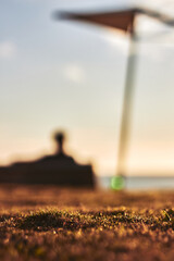 person on the beach watching the sunset