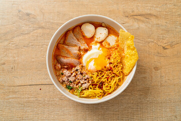 egg noodles with pork and meatball in spicy soup