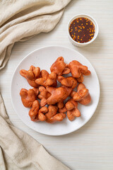 fried sausage with dipping sauce