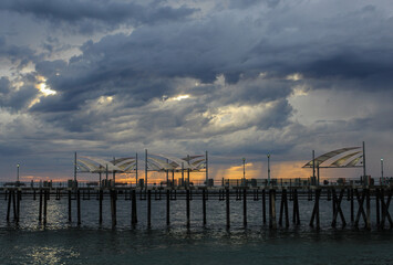 Storm clouds hover over the Pacific Ocean, seen from the Redondo Beach Pier, Los Angeles County, California. 