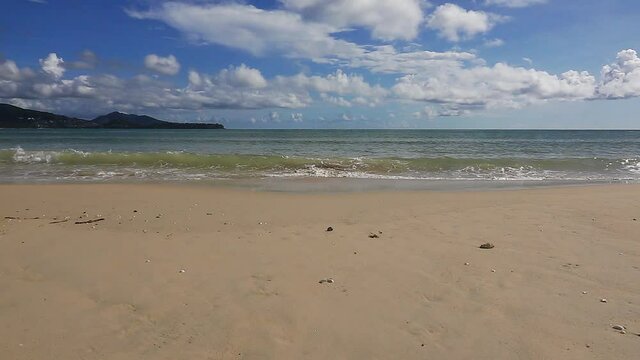View of tropical beach.
Peaceful and beautiful beach in sunny day of phuket island with cloud blue sky,HD slow motion video.
 