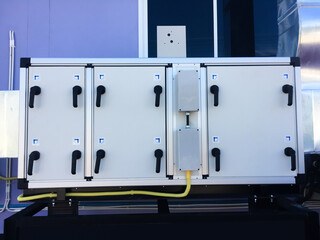 Indoor electrical control cabinets are installed outside the building for safety, security, and easy for operator control. Soft and selective focus.