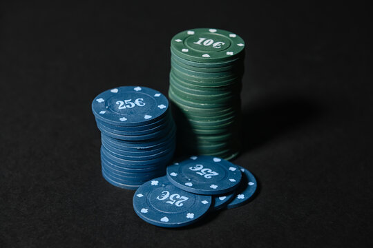 Poker chips on dark background
