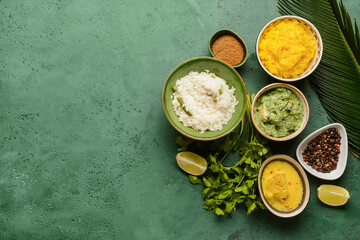 Traditional Indian food and spices on color background