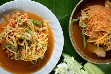 Papaya Salad with Mango Noodles, a popular Thai street food. copy space