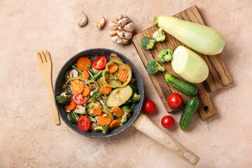 Composition with different vegetables on color background